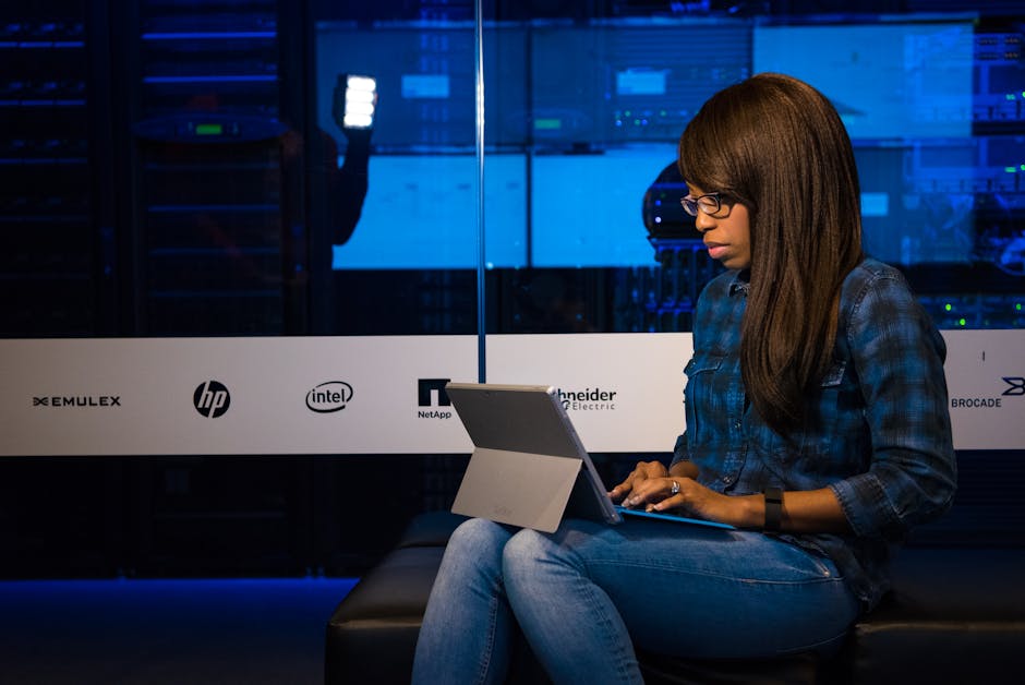 Woman working in server room